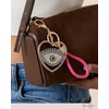 image:imageJessica Simpson Turquoise or Pave Crystal Bag Charm Keychain for WomenMulti Evil Eye
